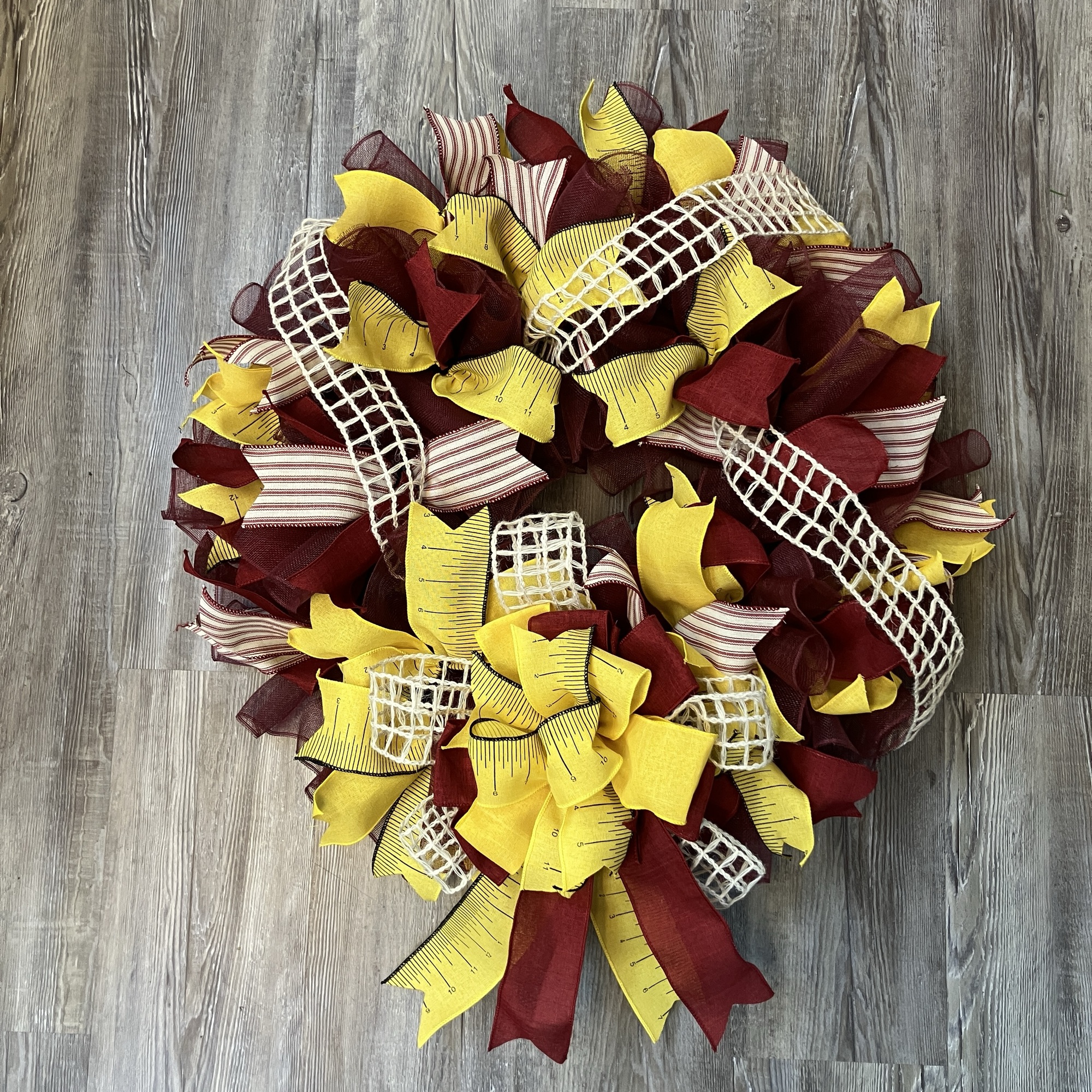 Finished ruffle mesh wreath made with 10.5 inch mesh squares and ribbon accents